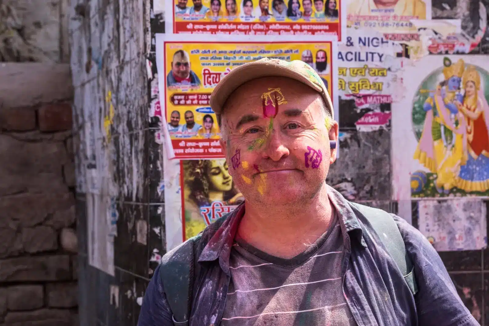 Tim Bird covered in coloured powder during Holi celebrations in India