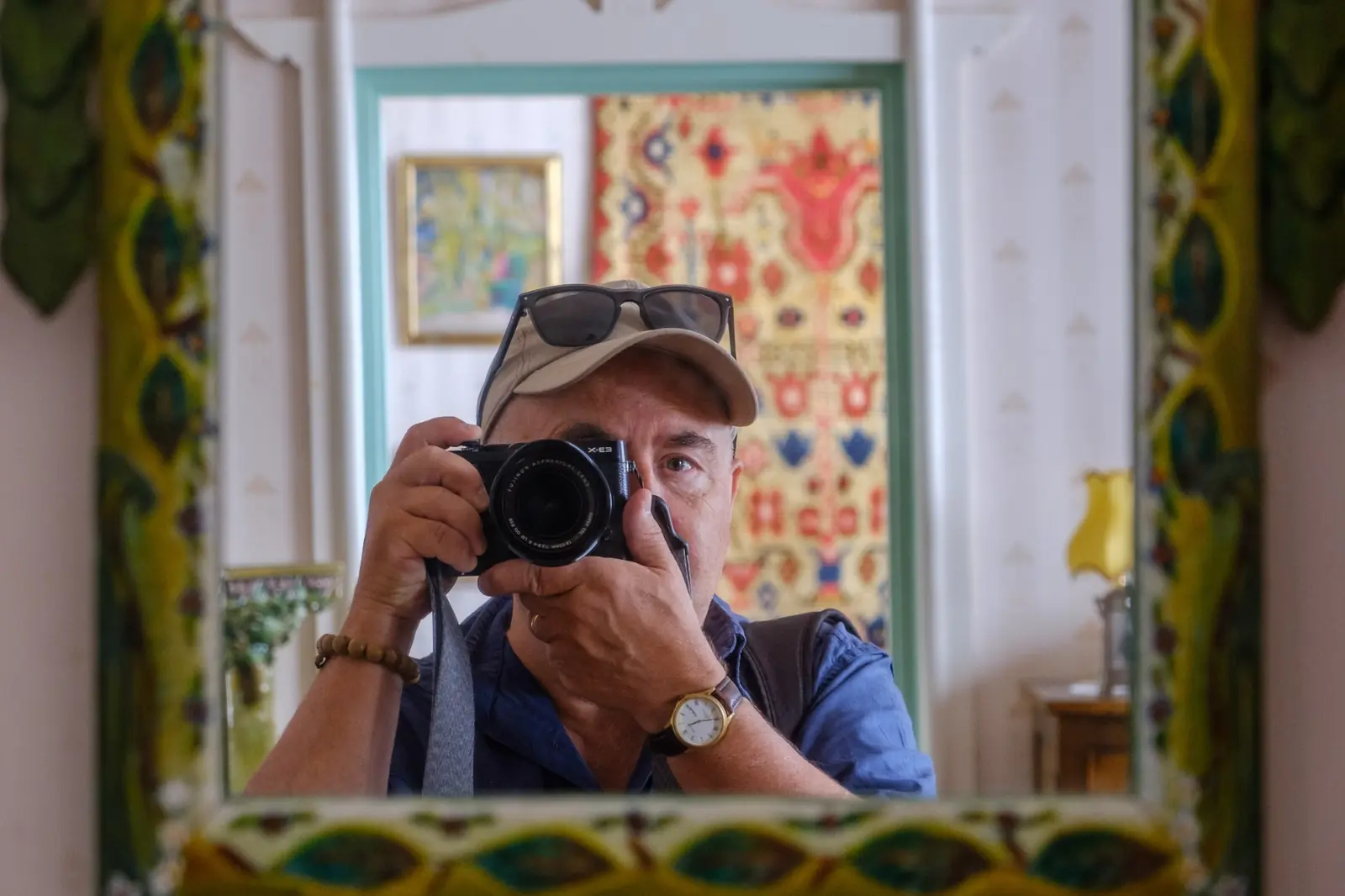 Tim Bird taking a self-portrait with his camera