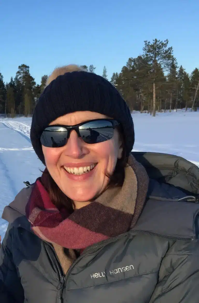 Jo Robertson in winter clothing outdoors in a snowy landscape