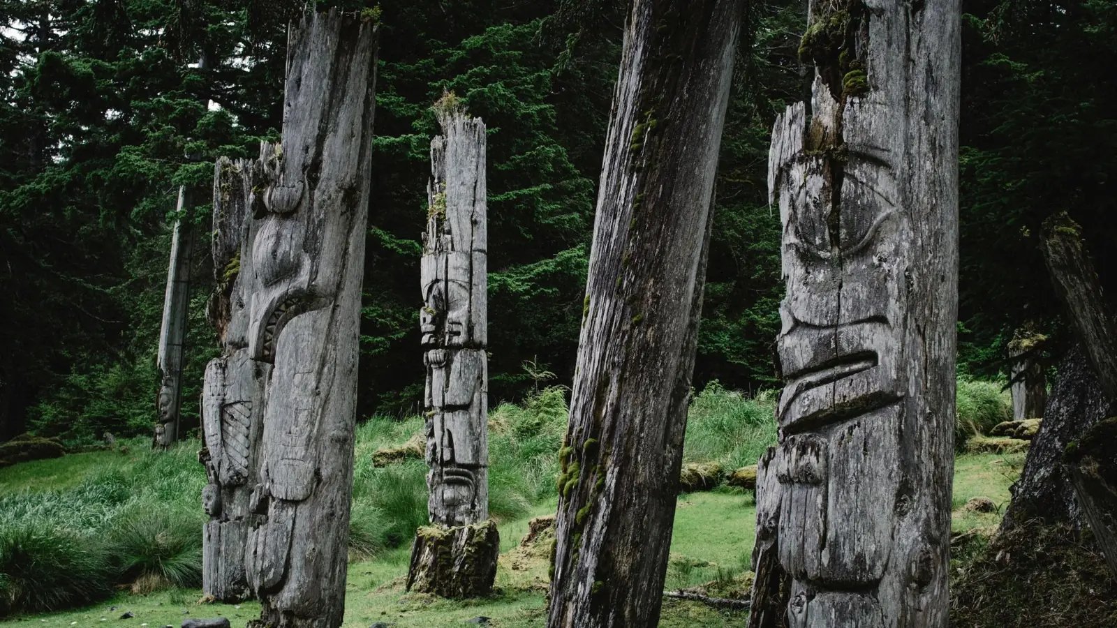 Carved poles at Haida Gwaii in British Columbia