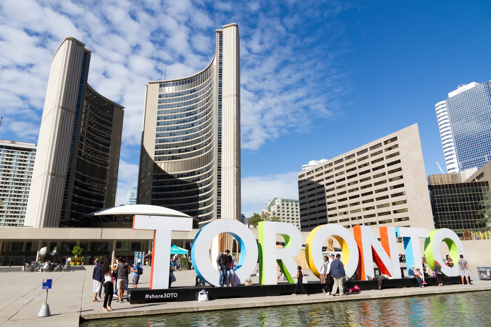 Toronto sign and City Hall at Nathan Phillips Square